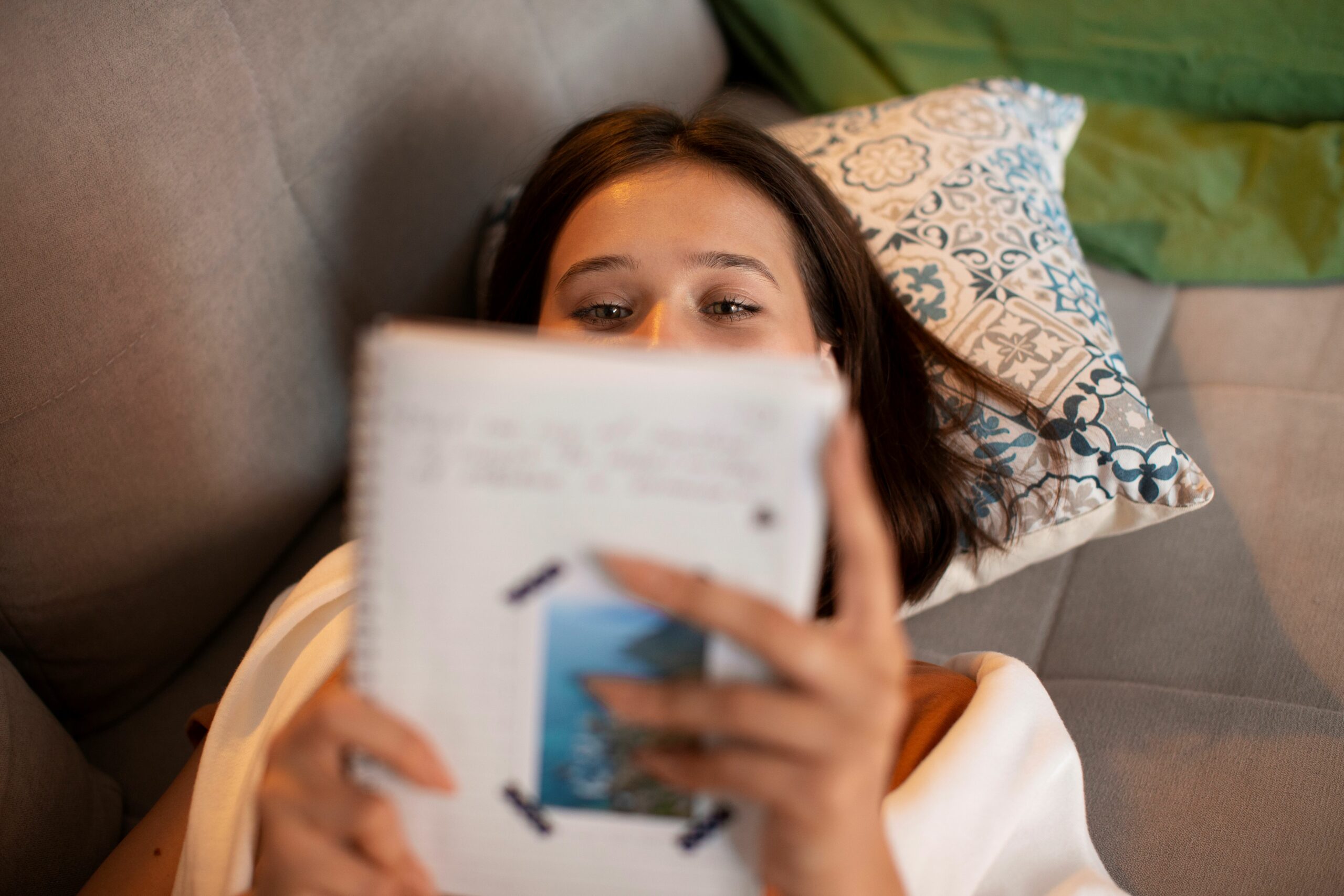high angle woman doing creative journaling scaled
